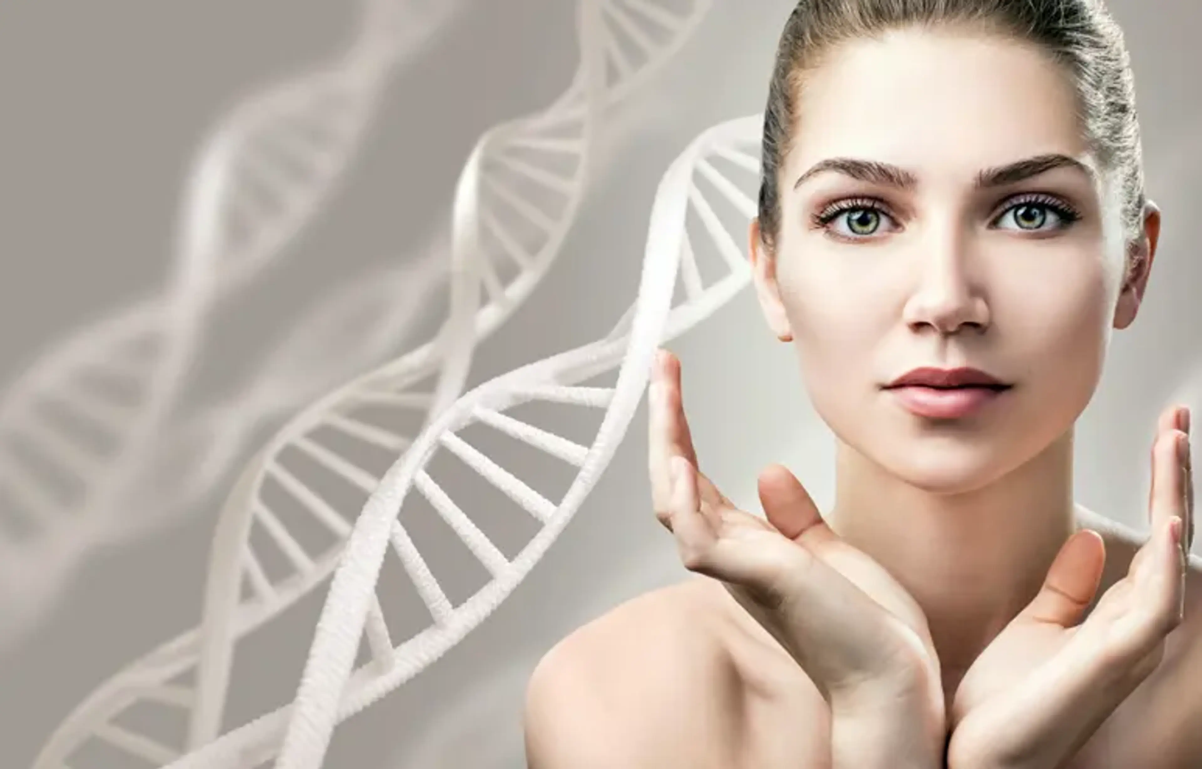 Woman with glowing skin gently framing her face with her hands, set against a DNA-inspired background symbolizing advanced facial skin care, anti-aging treatments and skin rejuvenation technology.