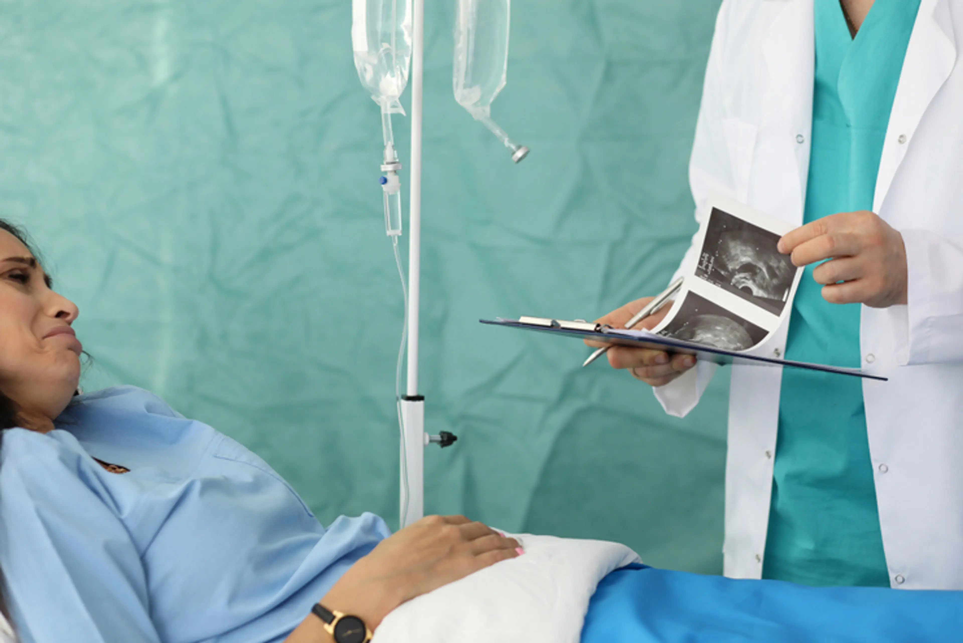 Woman receiving compassionate gynecological support for miscarriage concerns and reproductive health care